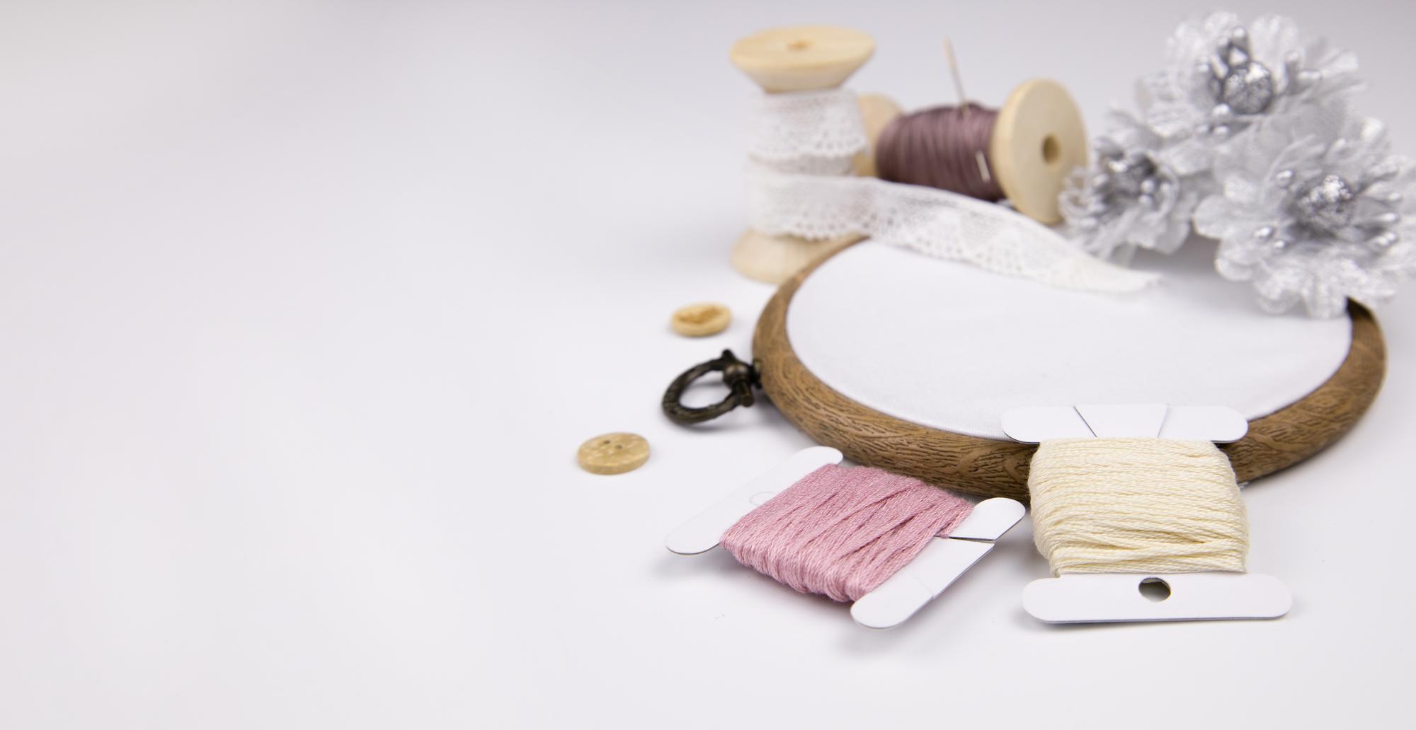 atelier worktable with threads and hoops
